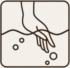 Soaking nails in warm soapy water